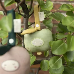 Image produit Hochet Pomme verte à clipser Coton Bio GOTS sur Shopetic
